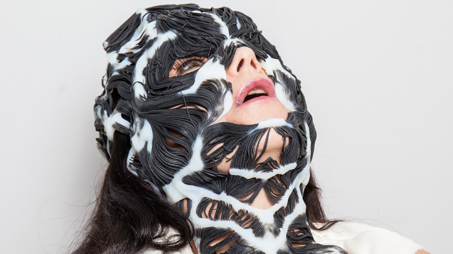 Björk wearing the Rottlace mask
