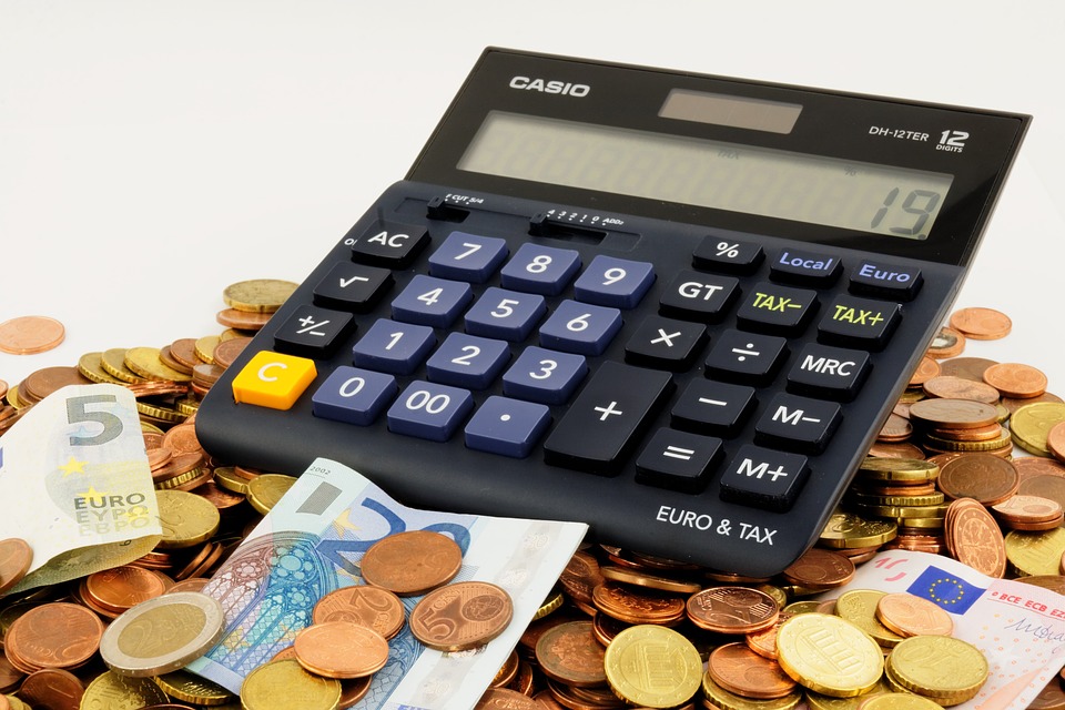 Clipart image of money and a calculator