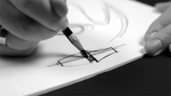 Designer sketching on paper