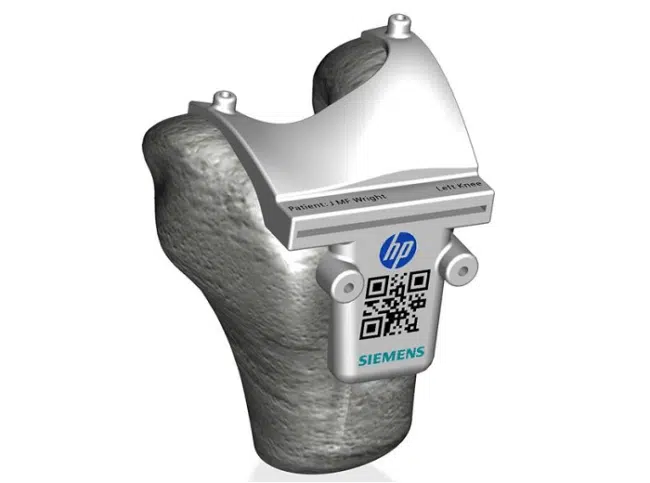 Siemens and HP colour 3D printed surgical cutting guide with scannable QR code