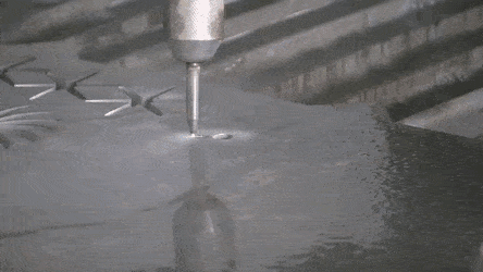 Waterjet machine cutting metal