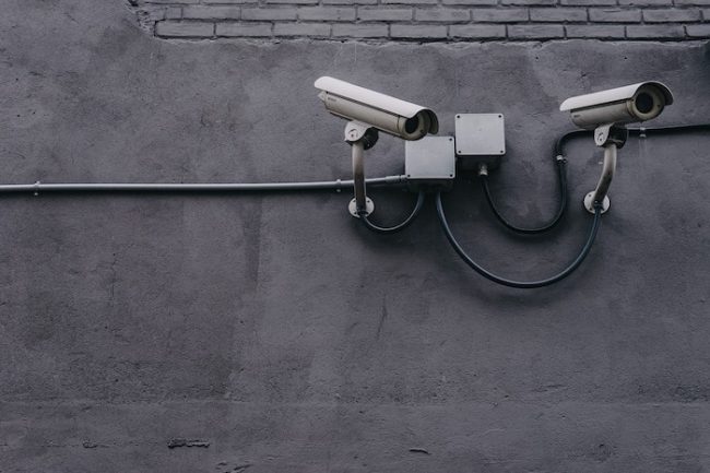 Security cameras mounted on concrete wall